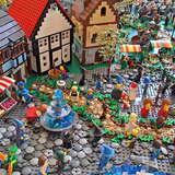 ludziki z klocków LEGO przedstawiające rycerzy i czarnoksiężników oraz zabudowania z klocków